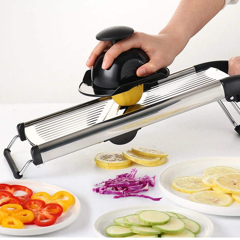 Manual mandoline slicer used with a hand guard